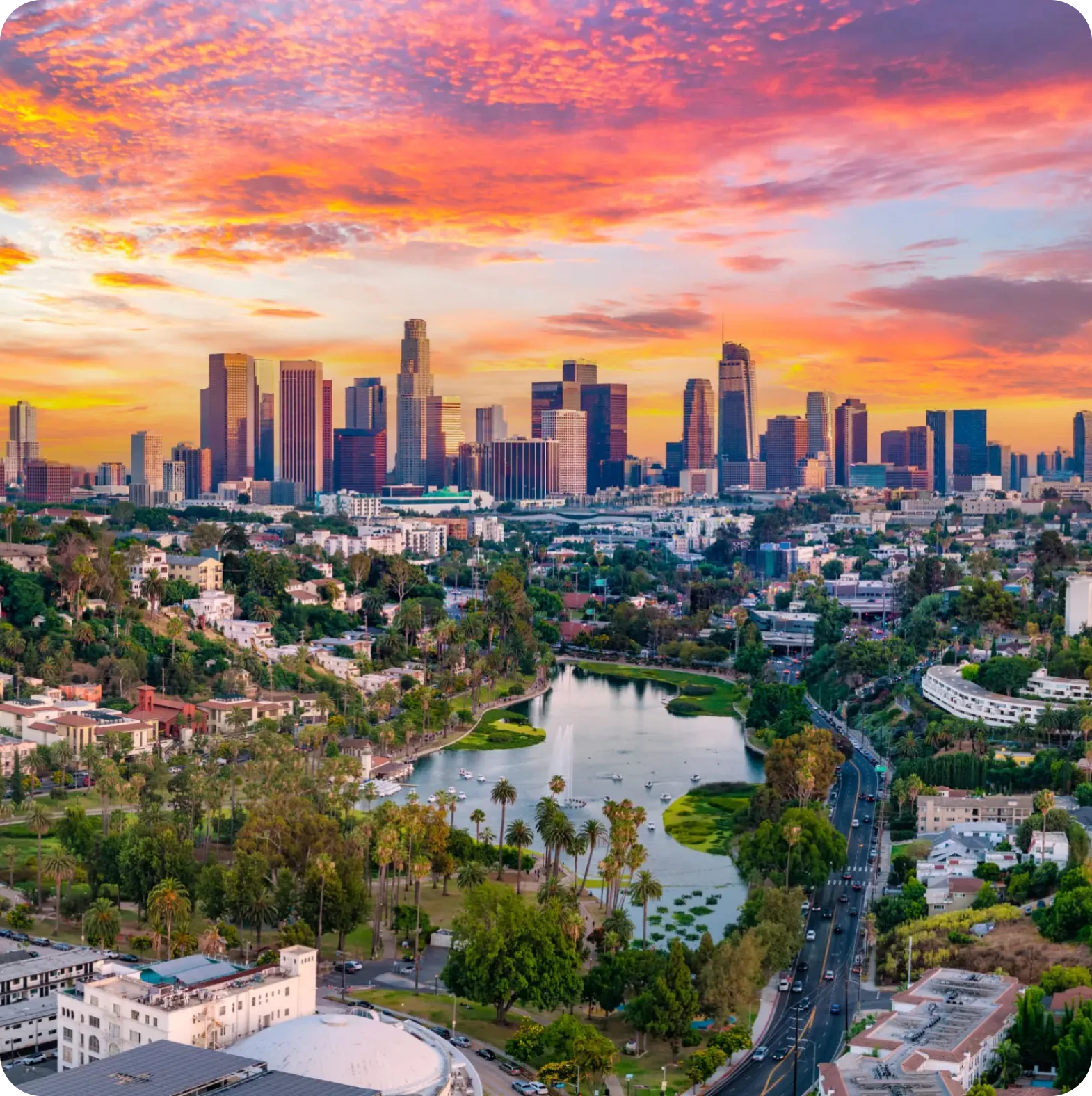 City skyline at sunset with vibrant sky
